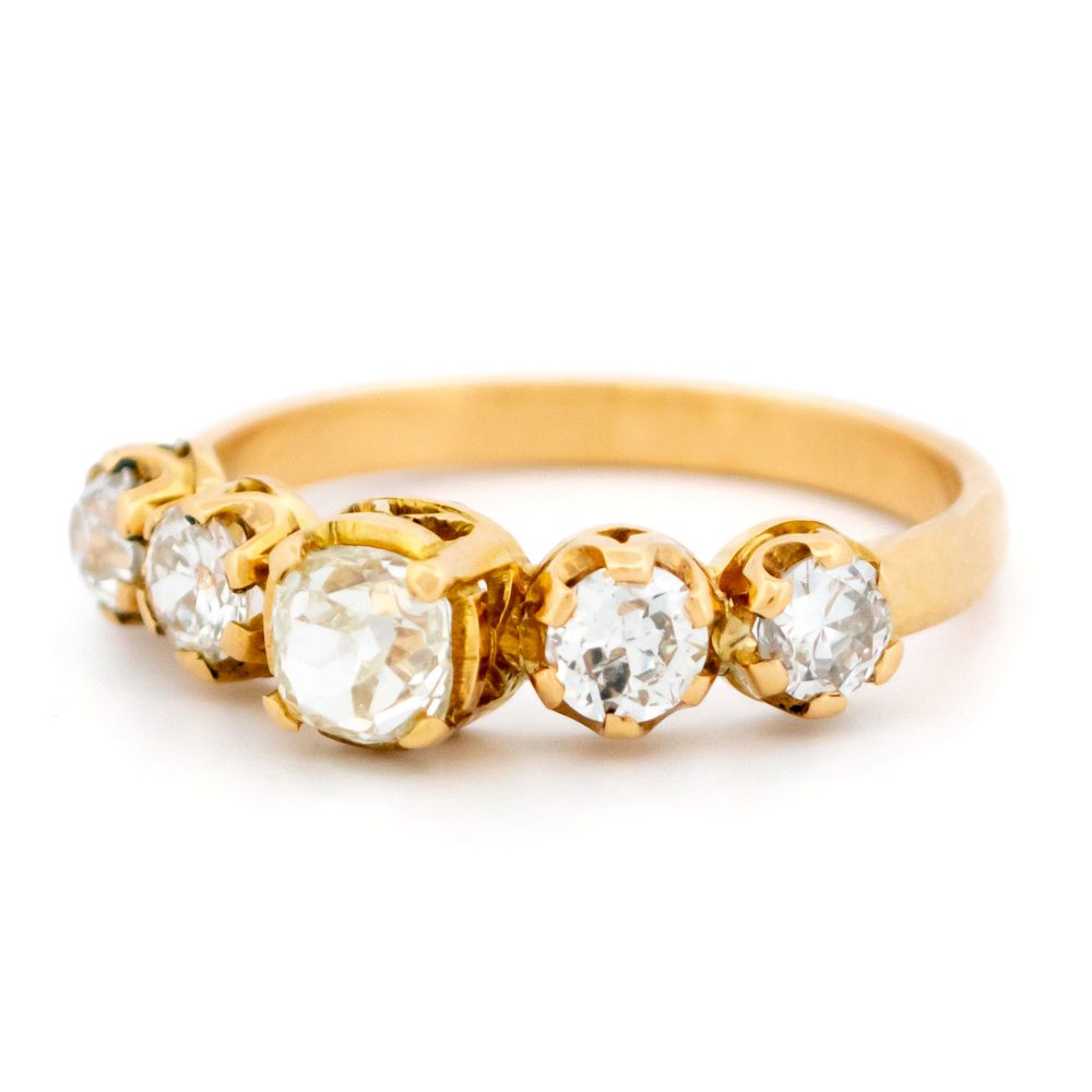 Vintage five stone diamond ring in gold.