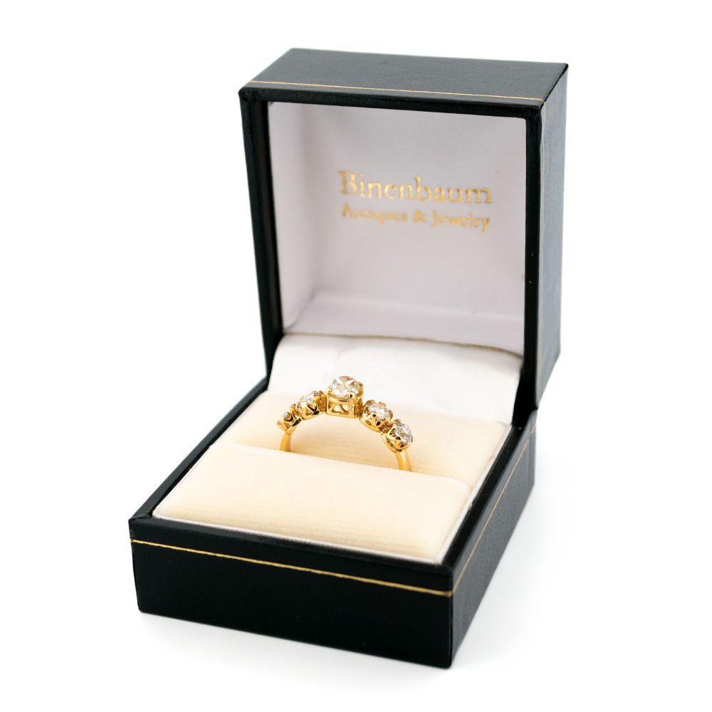 Vintage five stone diamond ring in gold.