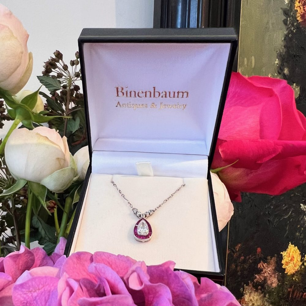 Vintage diamond and ruby necklace in platinum.