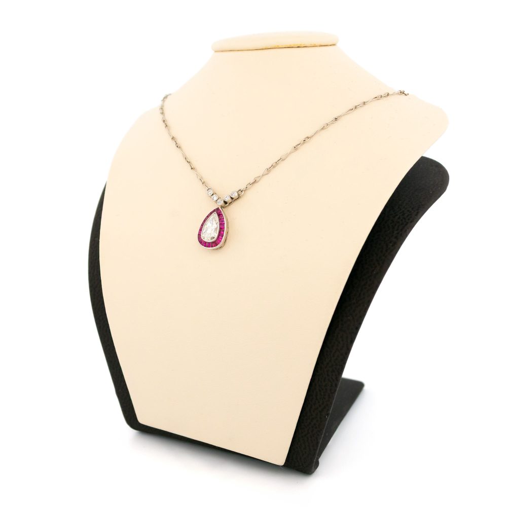 Vintage diamond and ruby necklace in platinum.