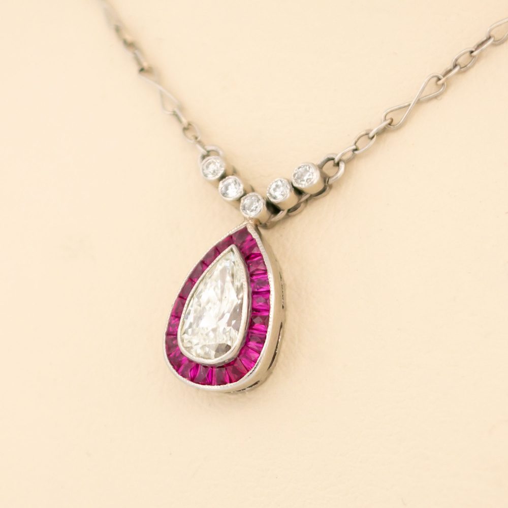 Vintage diamond and ruby necklace in platinum.