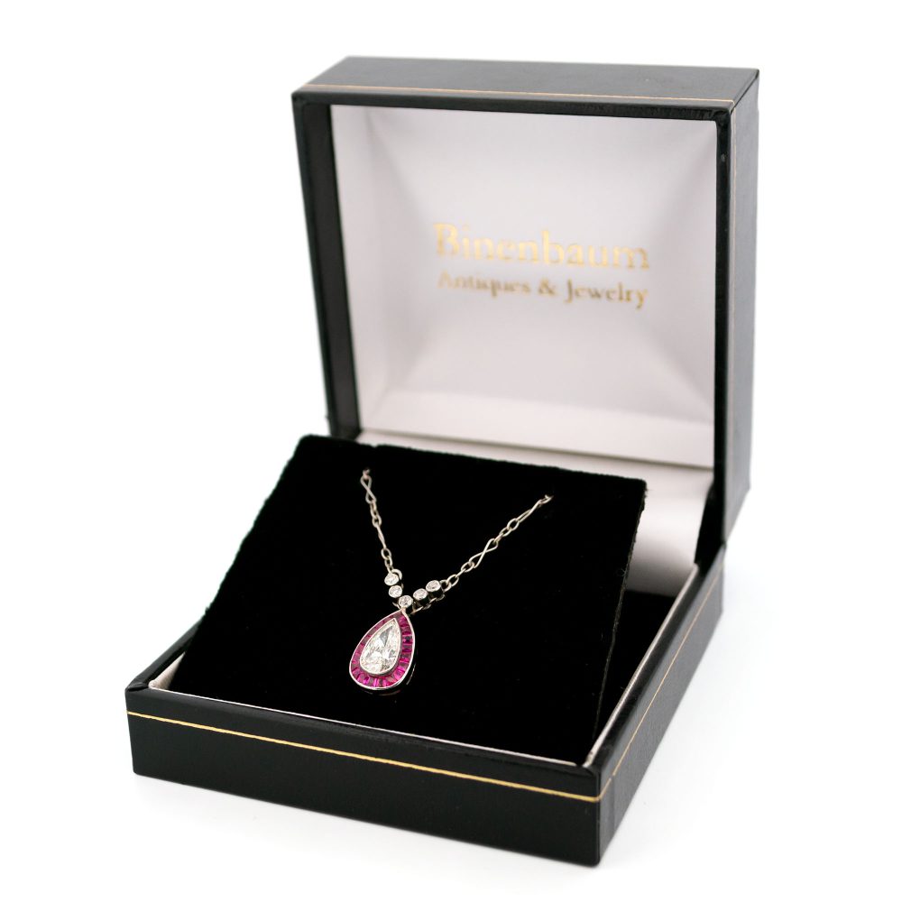 Vintage diamond and ruby necklace in platinum.