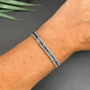 Edwardian Antique French Sapphire and Rose Cut Diamond Line Bracelet, panel links row of calibre sapphires framed by sparkling rose-cut diamonds in platinum to 18ct yellow gold. Circa 1910