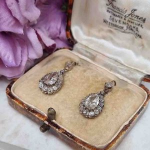 Antique Old Cut Pear Diamond Cluster Drop Earrings, 3.50 carats, 1ct Pear-shaped old-cut diamonds surrounded by border of old-cut diamonds in teardrop cluster designs, suspended from rose-cut diamond solitaire tops in silver to 15ct yellow gold