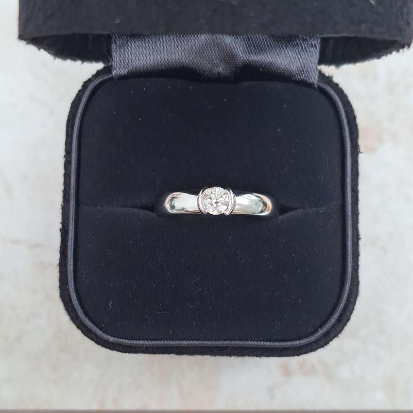 Tiffany and Co Etoile Diamond Solitaire Engagement Ring, single stone 0.30ct round brilliant-cut diamond flush into 4mm platinum band. Numbered 22279653