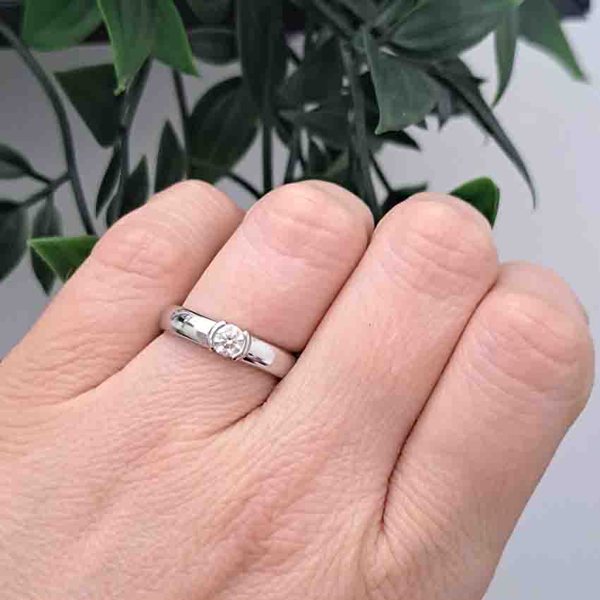 Tiffany and Co Etoile Diamond Solitaire Engagement Ring, single stone 0.30ct round brilliant-cut diamond flush into 4mm platinum band. Numbered 22279653