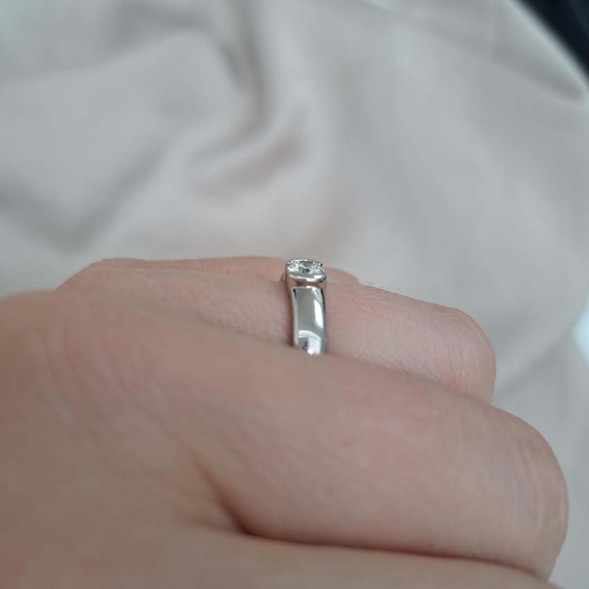 Tiffany and Co Etoile Diamond Solitaire Engagement Ring, single stone 0.30ct round brilliant-cut diamond flush into 4mm platinum band. Numbered 22279653