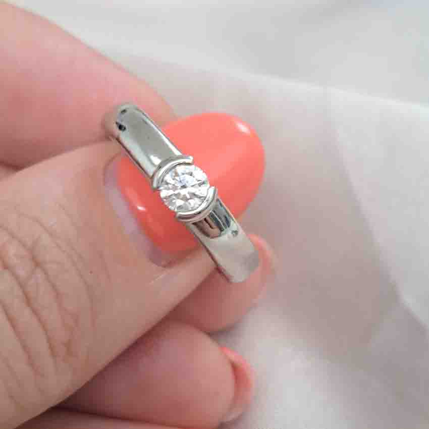 Tiffany and Co Etoile Diamond Solitaire Engagement Ring, single stone 0.30ct round brilliant-cut diamond flush into 4mm platinum band. Numbered 22279653