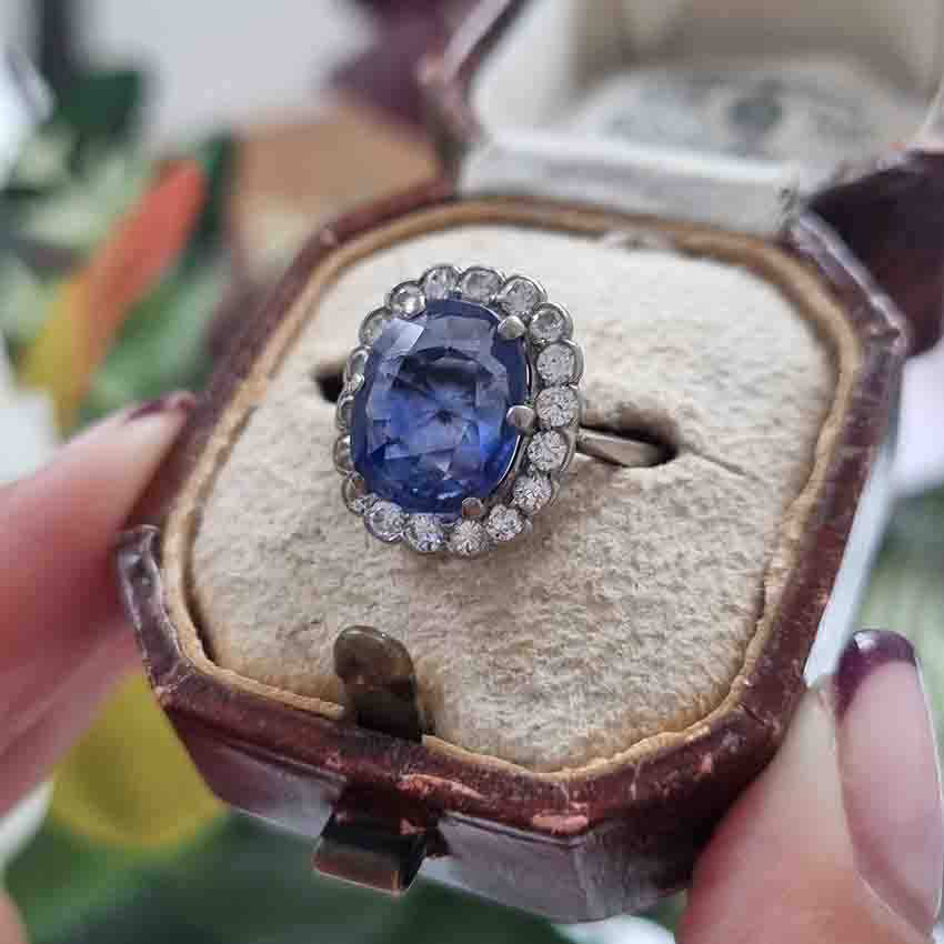 Vintage Antique Art Deco Natural No Heat 4.30ct Oval Cushion Cut Sapphire and Old Cut Diamond Cluster Engagement Ring in Platinum and 18ct Gold, Circa 1920s