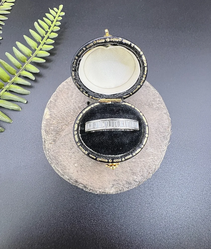 Diamond eternity ring in white gold.