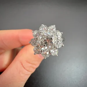 Vintage 2.20ct Diamond Daisy Cluster Engagement Ring in Platinum, 1.20ct diamond surrounded by further 1ct of diamonds in timeless flower design, Circa 1980s