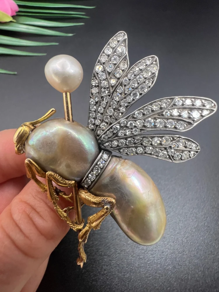 Vintage Abalone Pearl Insect Brooch with Diamonds, late Art Deco fly brooch with shimmering abalone pearl body and 2.50cts diamond wings in silver and 18ct yellow gold, Circa 1930s