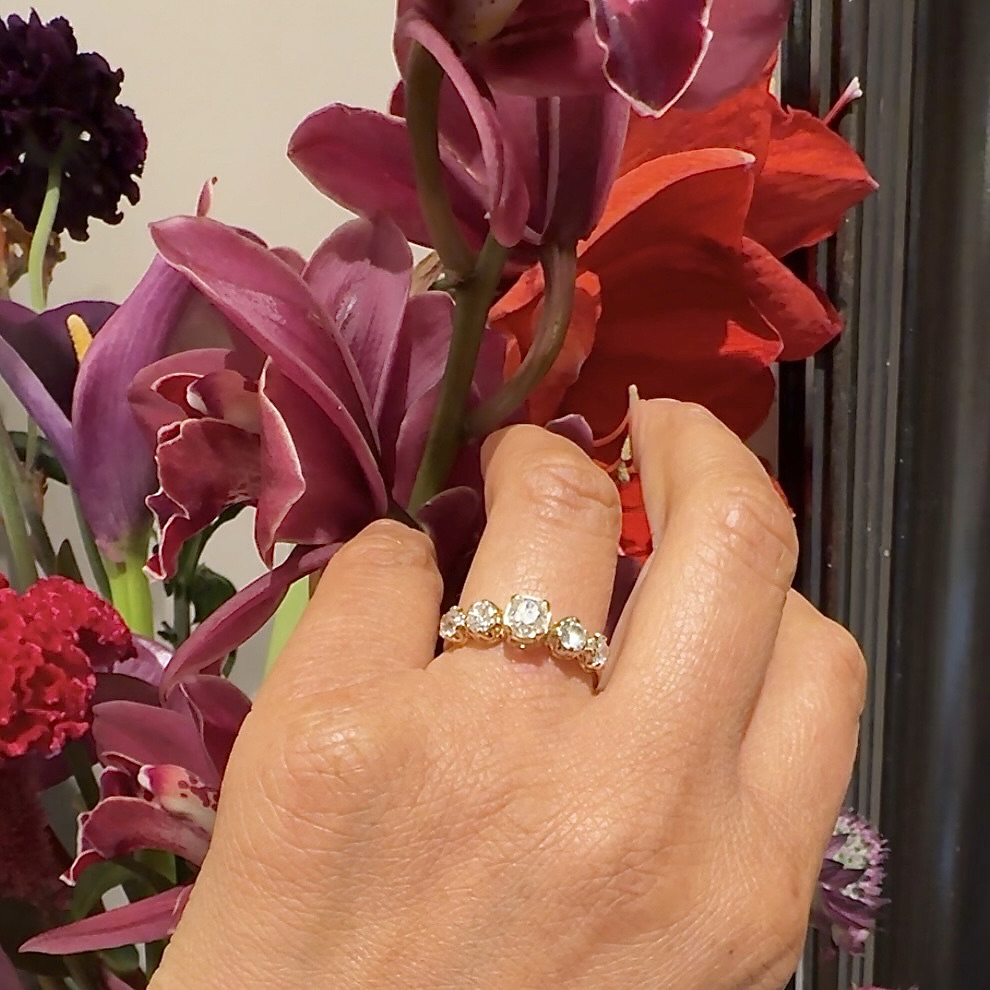 Vintage five stone diamond ring in gold.