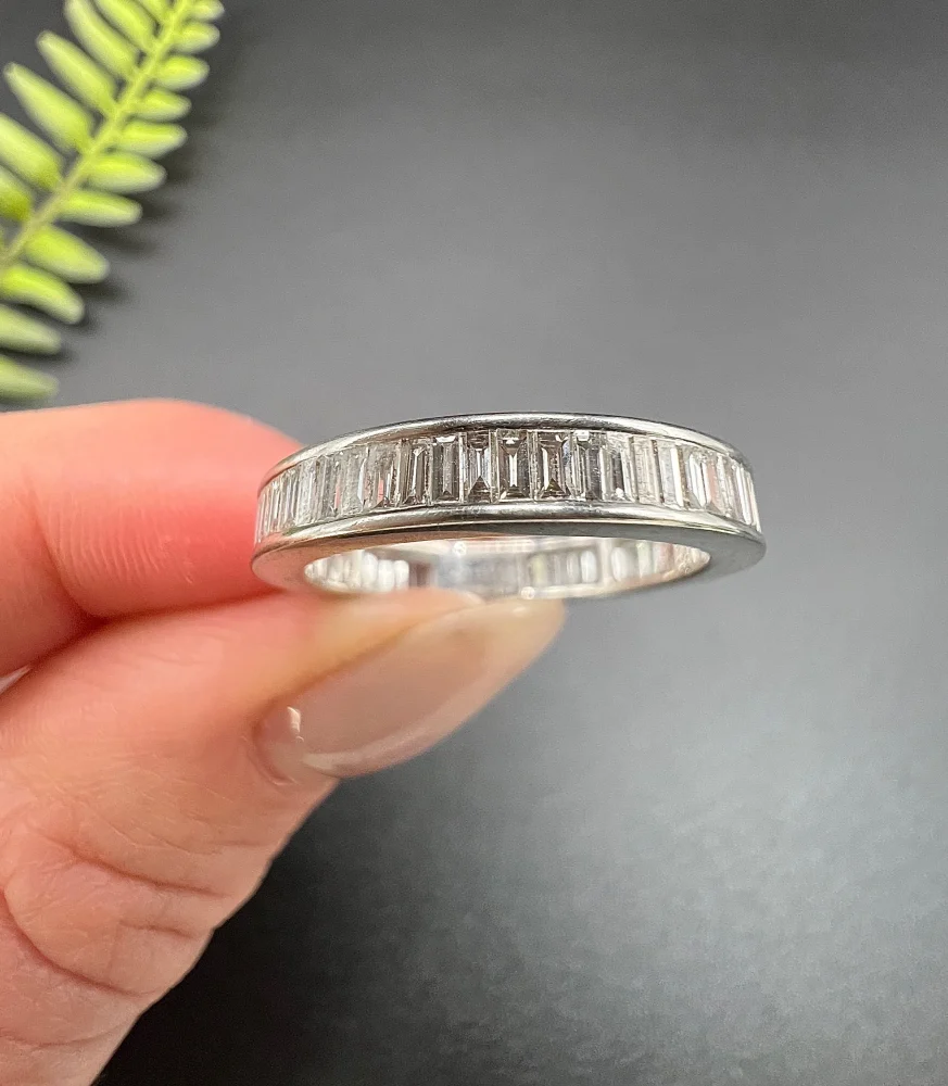 Diamond eternity ring in white gold.