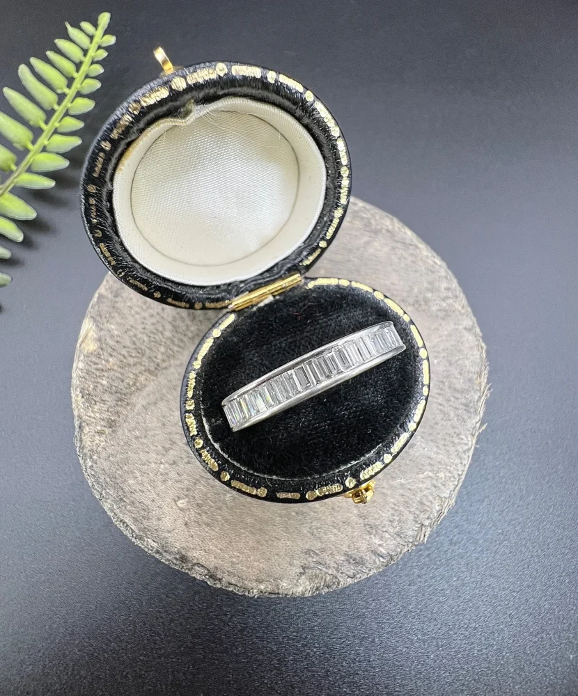 Diamond eternity ring in white gold.