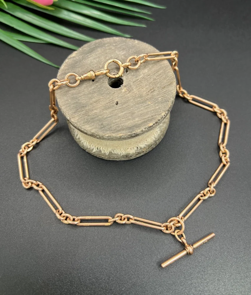 Antique 9ct Rose Gold Trombone and Fetter Link Albert Chain Necklace, Each link stamped with 9 & 375 with a swivel and bolt ring clasp and 36mm T-bar, Chester 1903