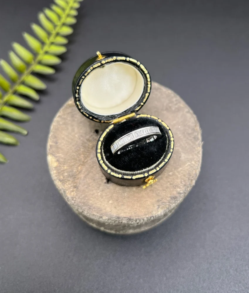 Diamond eternity ring in white gold.