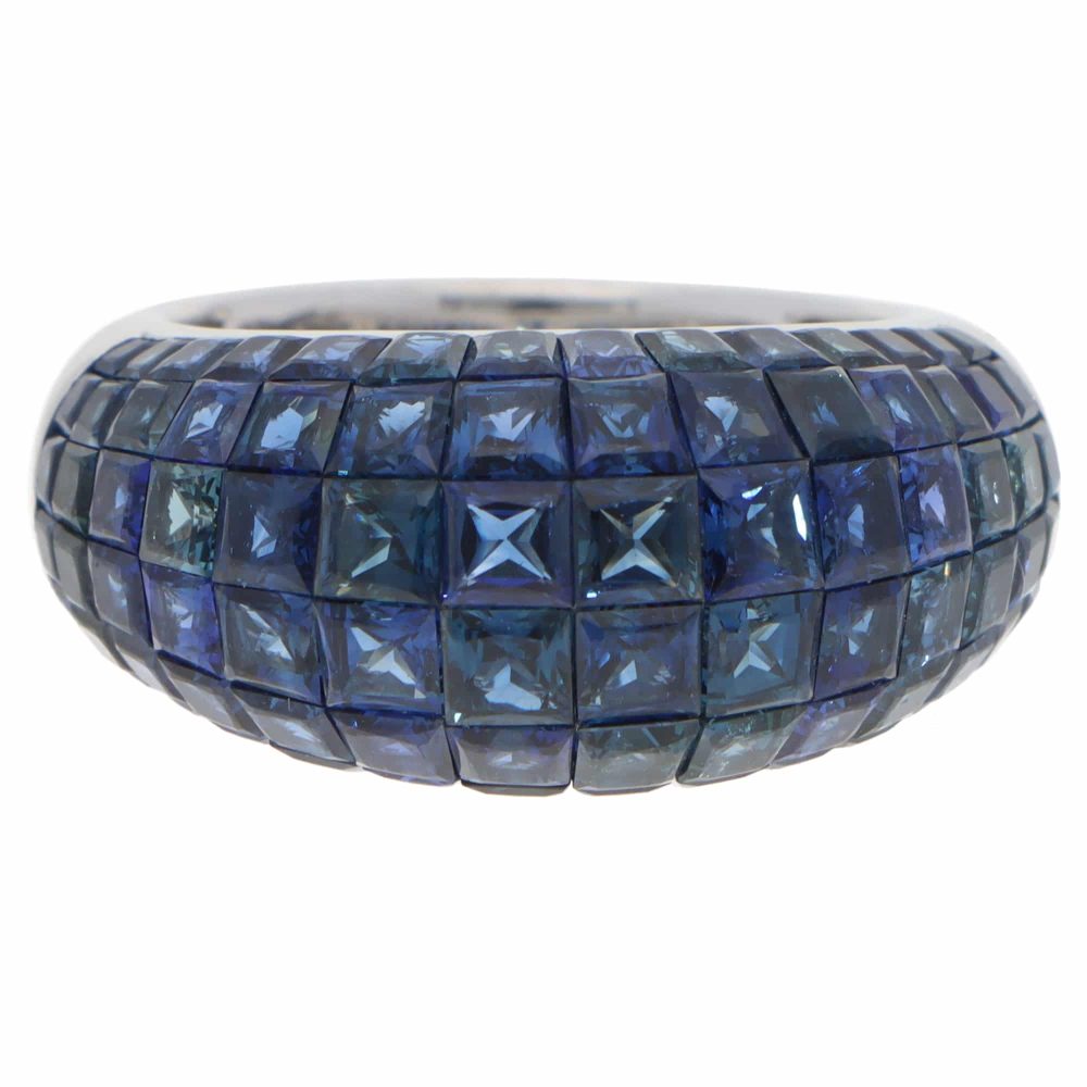 Contemporary 16.69ct Sapphire Bombe Cocktail Ring in 18ct White Gold, six rows of graduated-sized French-cut sapphires securely invisible-set