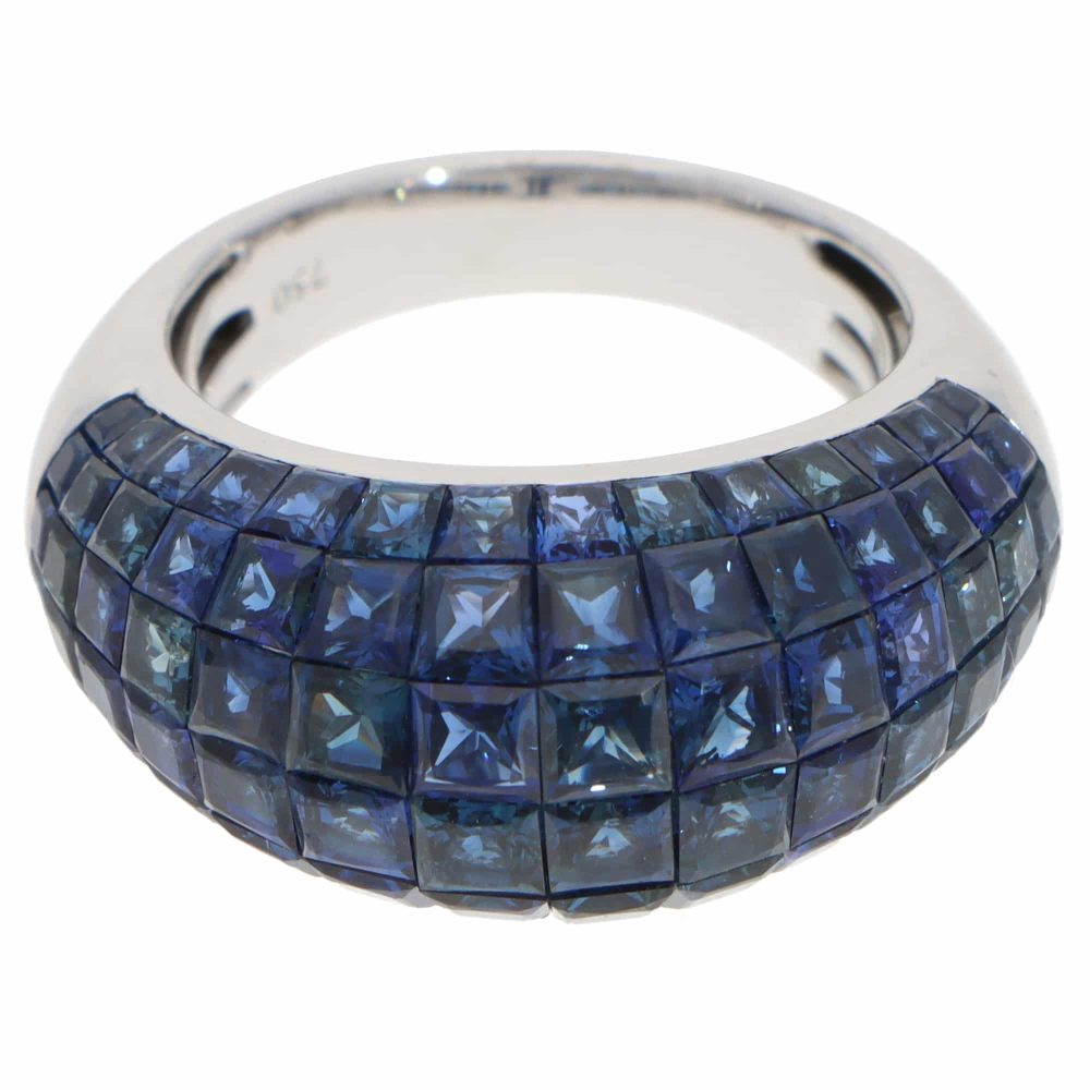 Contemporary 16.69ct Sapphire Bombe Cocktail Ring in 18ct White Gold, six rows of graduated-sized French-cut sapphires securely invisible-set