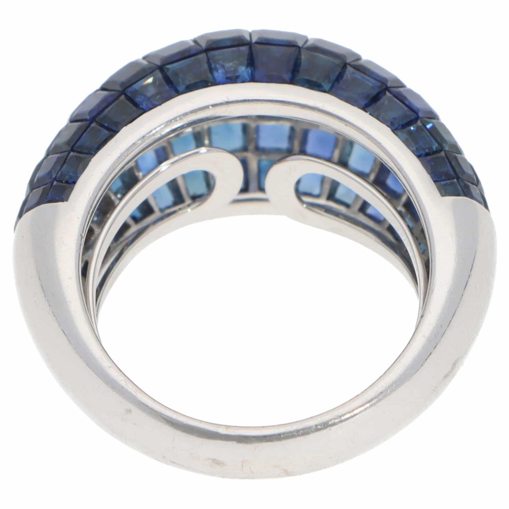 Contemporary 16.69ct Sapphire Bombe Cocktail Ring in 18ct White Gold, six rows of graduated-sized French-cut sapphires securely invisible-set