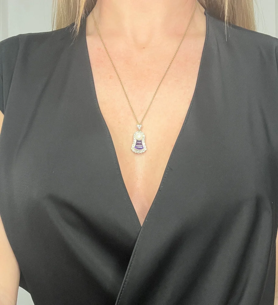 Edwardian amethyst, diamond and pearl pendant in gold and platinum.