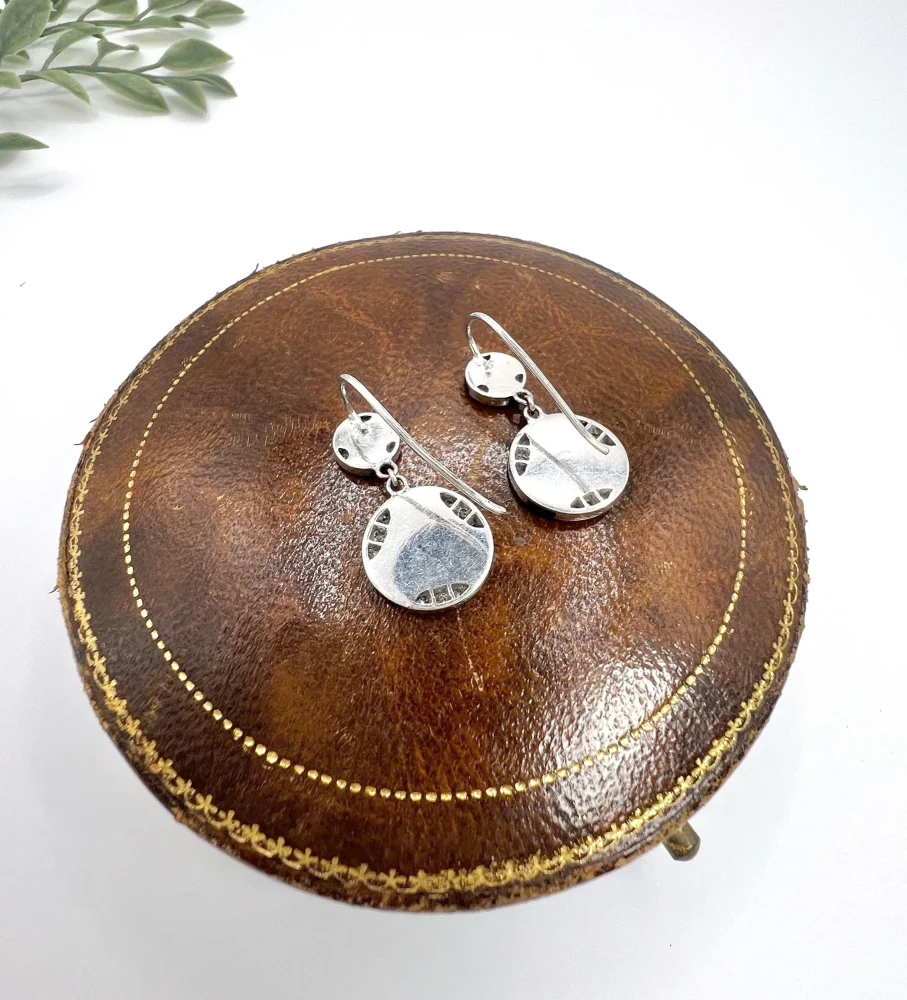 Art Deco diamond and onyx earrings in white gold.