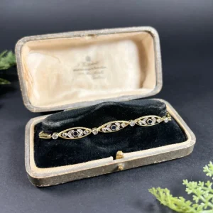 Antique gold and platinum bracelet with diamonds and sapphires.