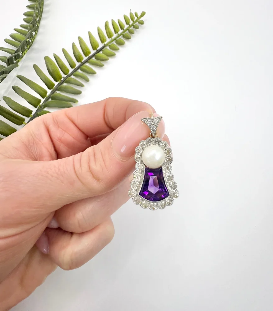 Edwardian amethyst, diamond and pearl pendant in gold and platinum.