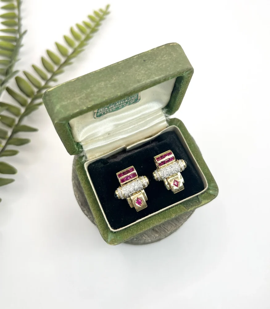 Art Deco diamond, ruby and onyx earrings in yellow and white gold.