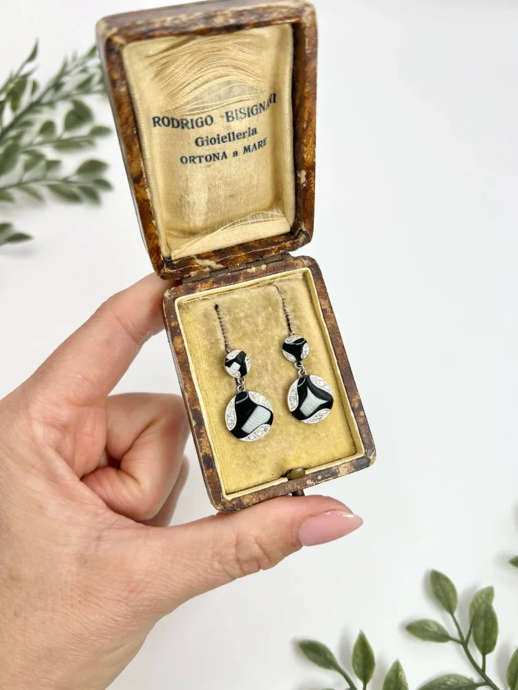 Art Deco diamond and onyx earrings in white gold.