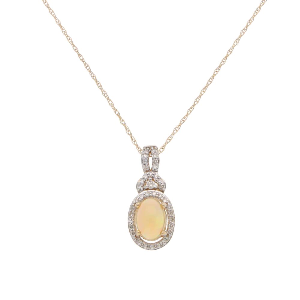 Opal and Diamond Cluster Pendant Necklace, oval cabochon opal is surrounded by 38 brilliant-cut diamonds in micro-claw settings in 14ct yellow gold on 18 inch yellow gold trace chain