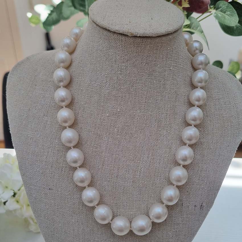 South Sea Pearl Necklace with Diamond Clasp, striking pearl necklace composed of South Sea pearls secured with a diamond set ball/bead shaped clasp