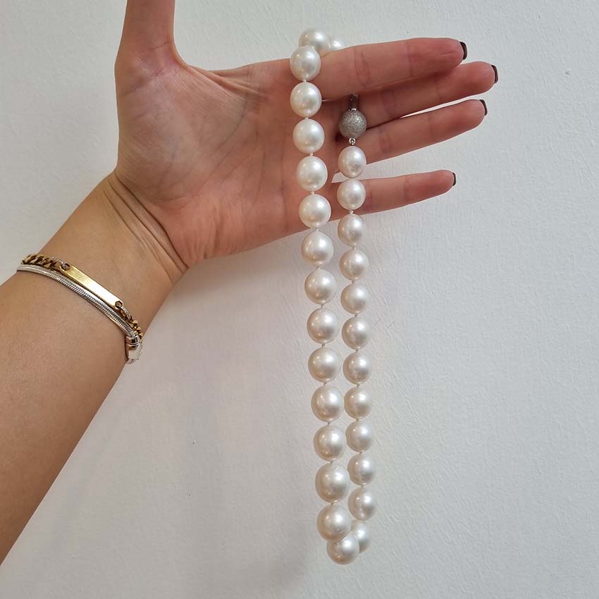 South Sea Pearl Necklace with Diamond Clasp, striking pearl necklace composed of South Sea pearls secured with a diamond set ball/bead shaped clasp