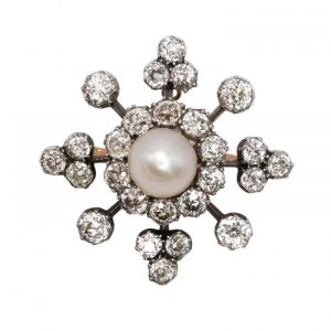 Victorian Antique Natural Pearl and Diamond Snowflake Cluster Pendant Brooch, natural bouton pearl surrounded by  old-cut diamonds in silver-upon-gold. Circa 1890