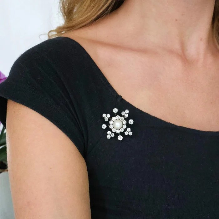 Victorian Antique Natural Pearl and Diamond Snowflake Cluster Pendant Brooch, natural bouton pearl surrounded by old-cut diamonds in silver-upon-gold. Circa 1890