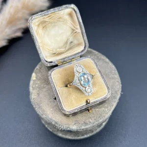 Antique aquamarine and diamond ring in rose gold and platinum.