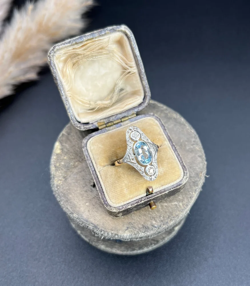 Antique aquamarine and diamond ring in rose gold and platinum.