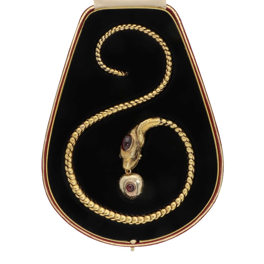 Victorian garnet snake necklace in gold.