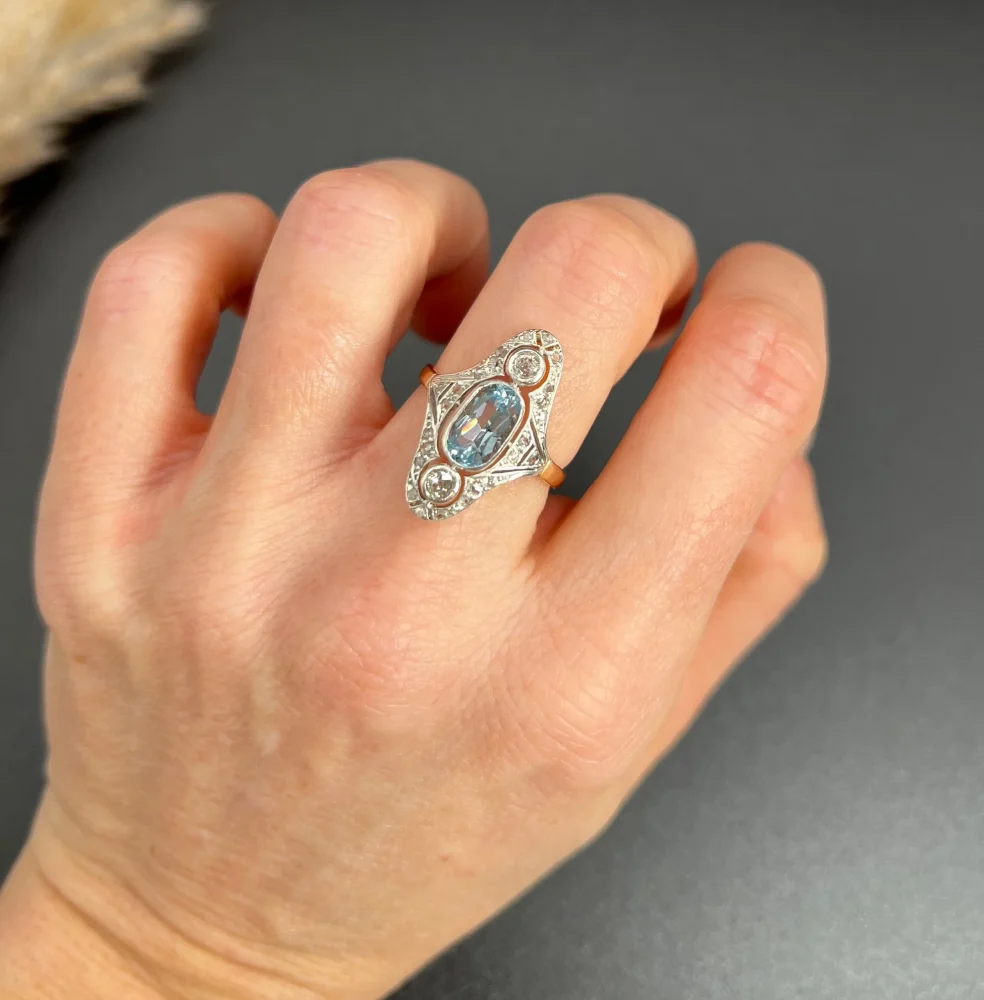 Antique aquamarine and diamond ring in rose gold and platinum.