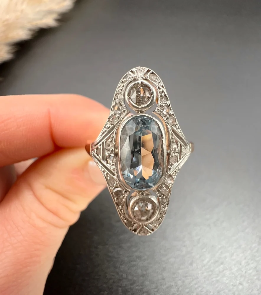 Antique aquamarine and diamond ring in rose gold and platinum.