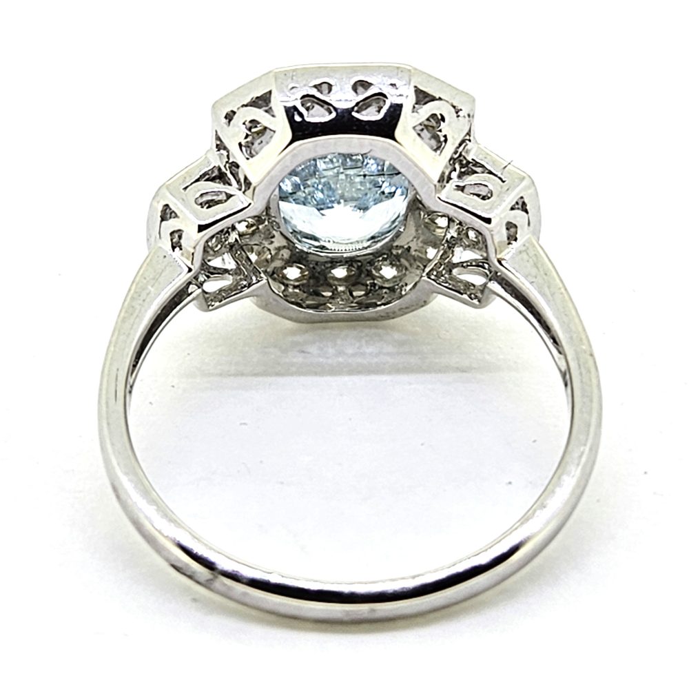 1.62ct Oval Aquamarine and Diamond Cluster Ring with Brilliant and Baguette Diamond Buckle Shoulders in 18ct White Gold