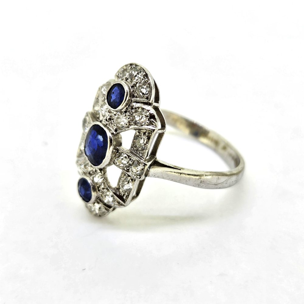 Sapphire and Diamond Trilogy Panel Ring, three stone tablet ring, Three sapphire set vertically up the finger within diamond panel surround