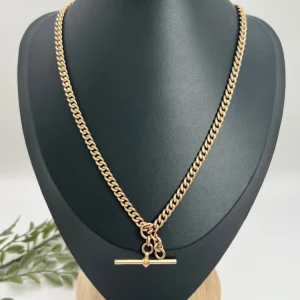 Antique Albert chain in rose gold.