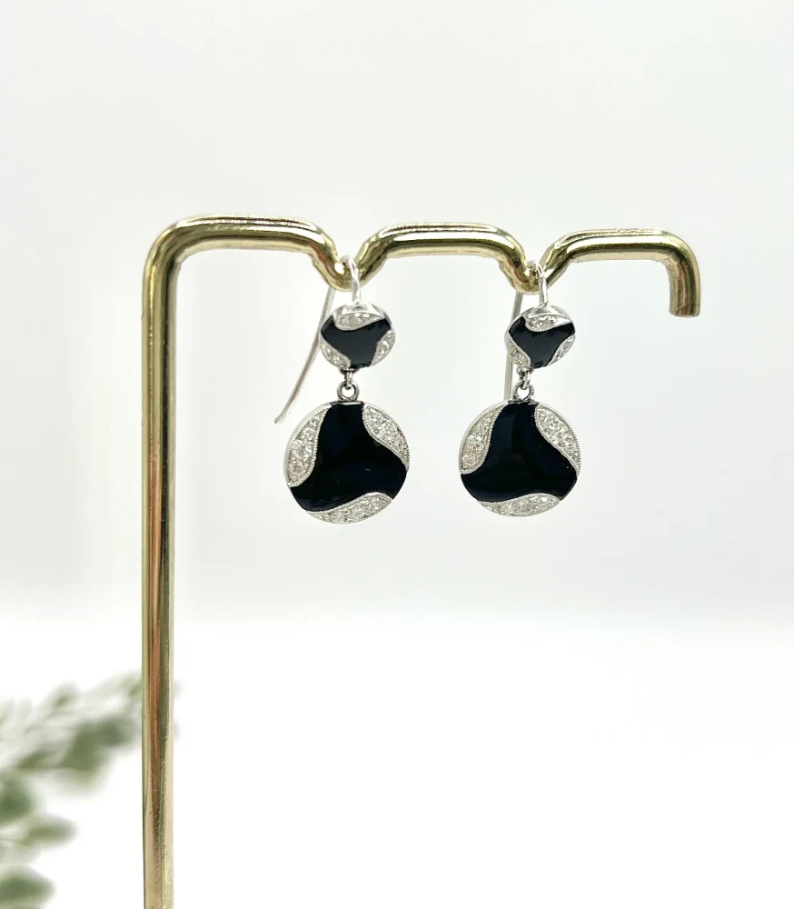 Art Deco diamond and onyx earrings in white gold.