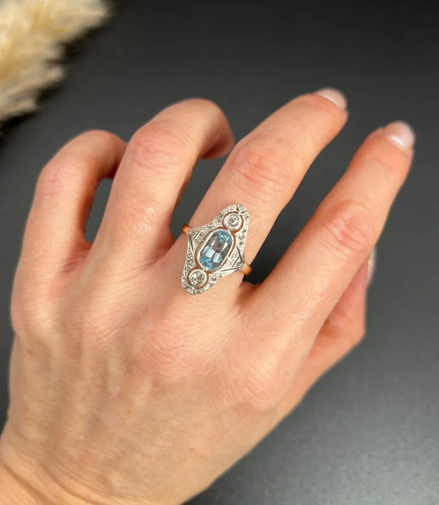 Antique aquamarine and diamond ring in rose gold and platinum.