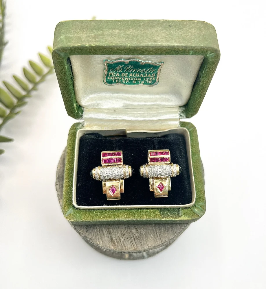 Art Deco diamond, ruby and onyx earrings in yellow and white gold.