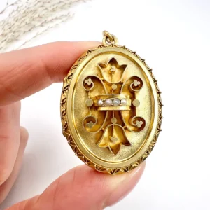 Victorian gold locket with seed pearls.
