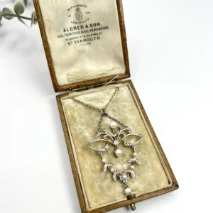 Edwardian pearl and diamond necklace open swag work platinum