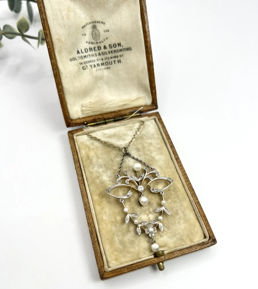 Edwardian pearl and diamond necklace open swag work platinum