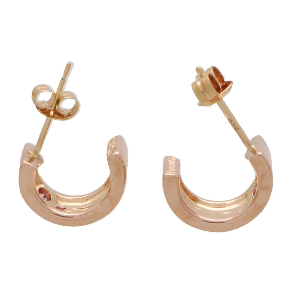 Vintage gold hoop earrings with pink sapphires.